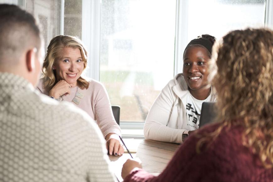 advising meeting at table